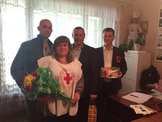 Поздравление председателя Красного Креста Жовтневой организацией